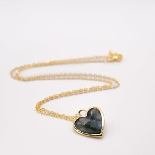 Lula sea Jewellery New Zealand labradorite heart pendant necklace, made from 18k gold and natural facet cut gem stone, vermeil,pictured laying on flat surface
