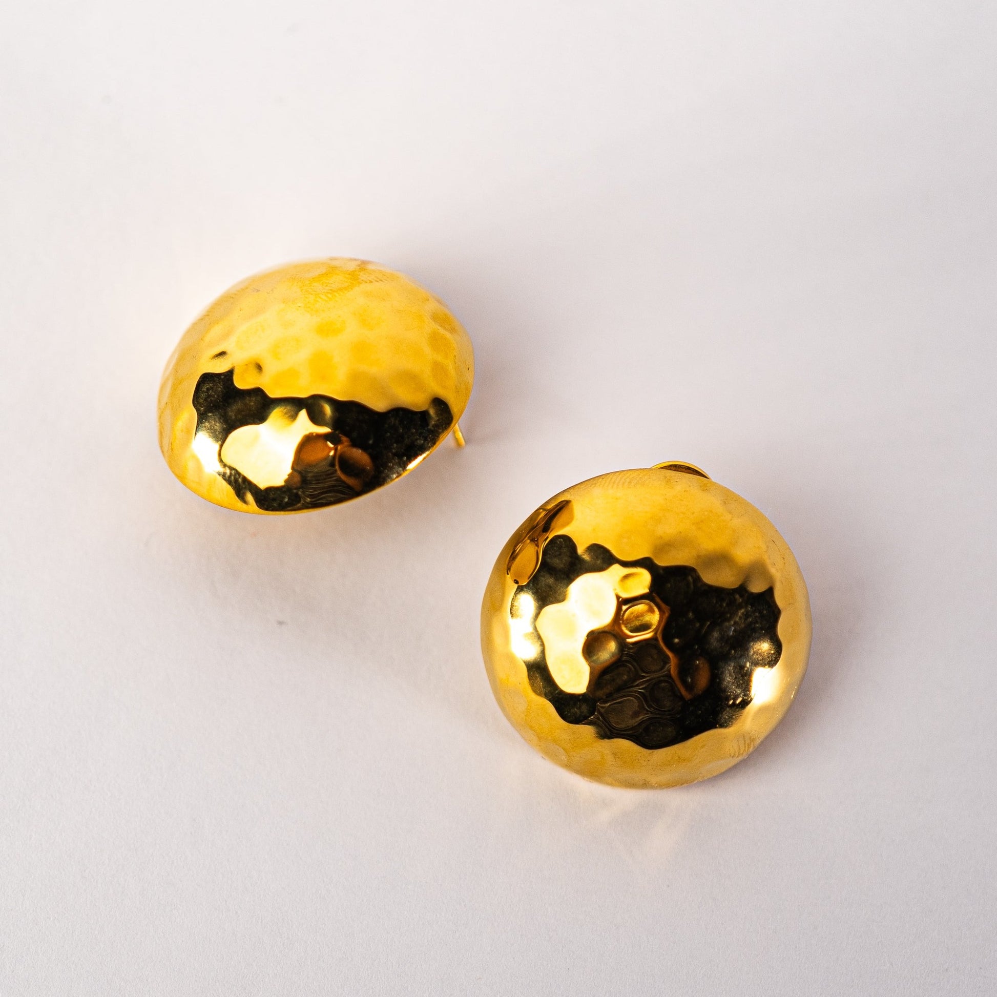 Lula Sea Oversized Golden Disco Stud earrings, side angle view